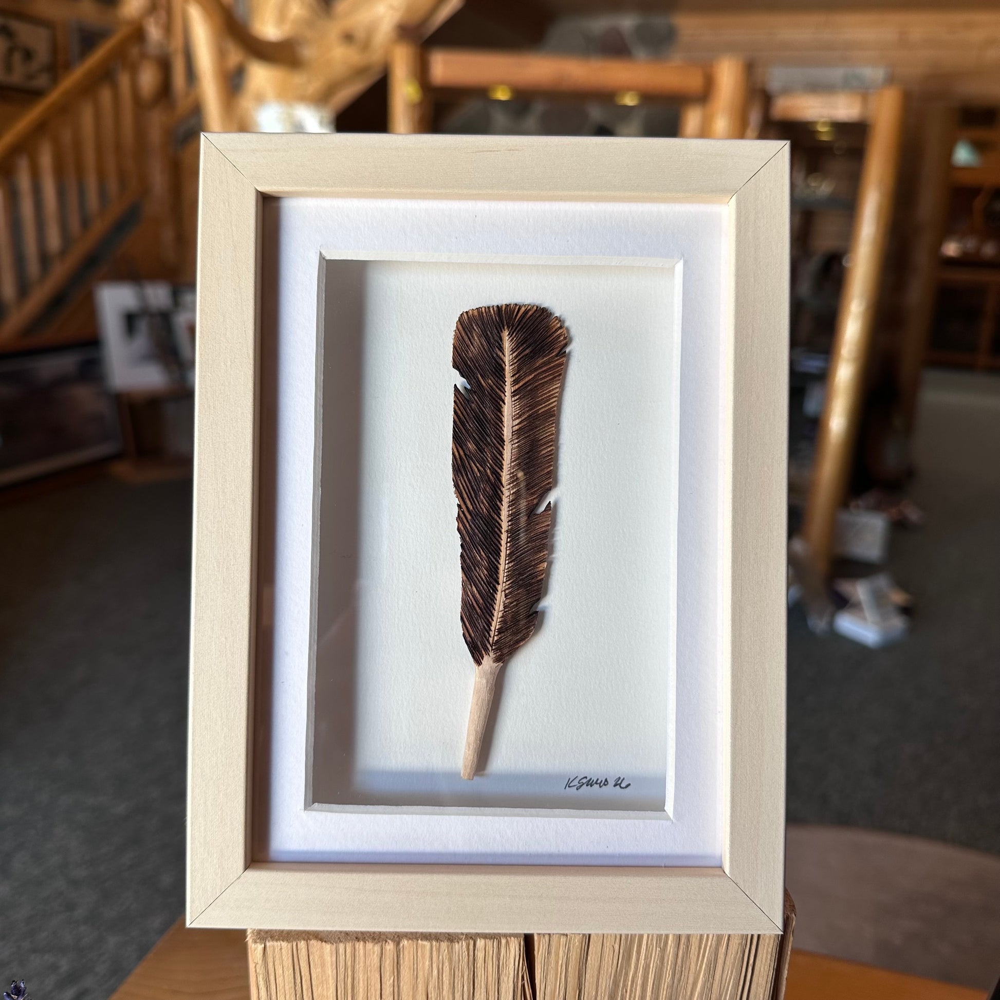 FRAMED CARVED FEATHER