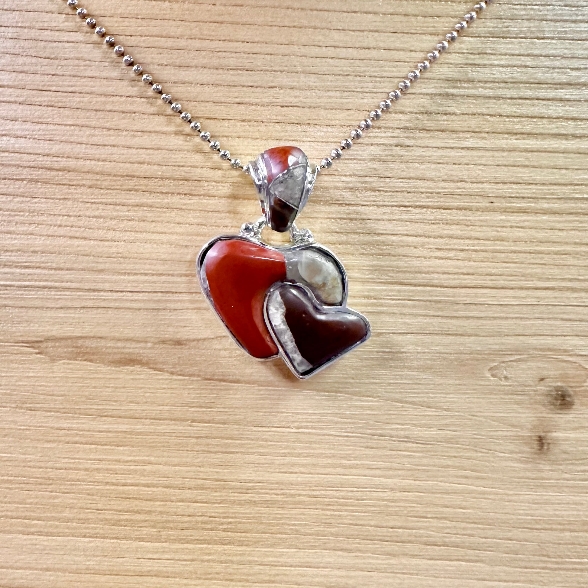 Puddingstone Heart Inside Heart Pendant